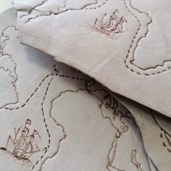 Embroidered leather detail, made by hand